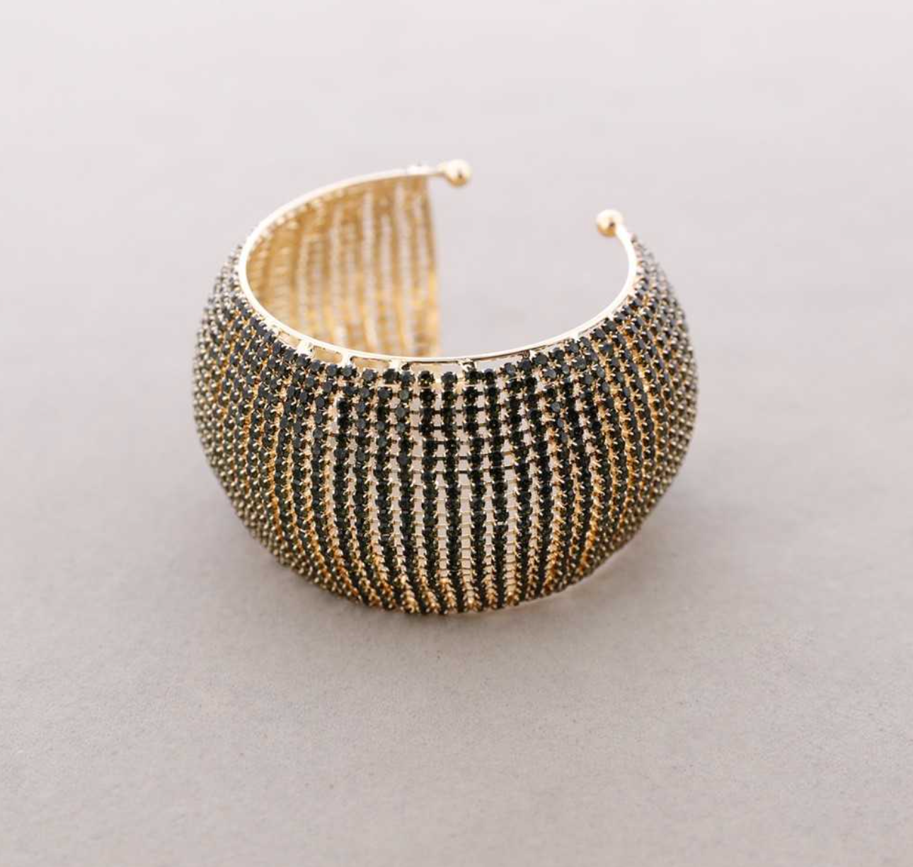 Brazalete circonitas gris , oro